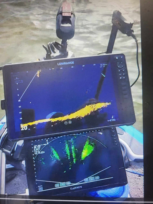 Dual electronics holder showing Lowrance HDS and Garmin units mounted on bass boat bow