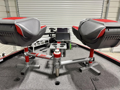 Dub-L-Seat dual fishing seat system installed on bass boat bow with Garmin fish finders